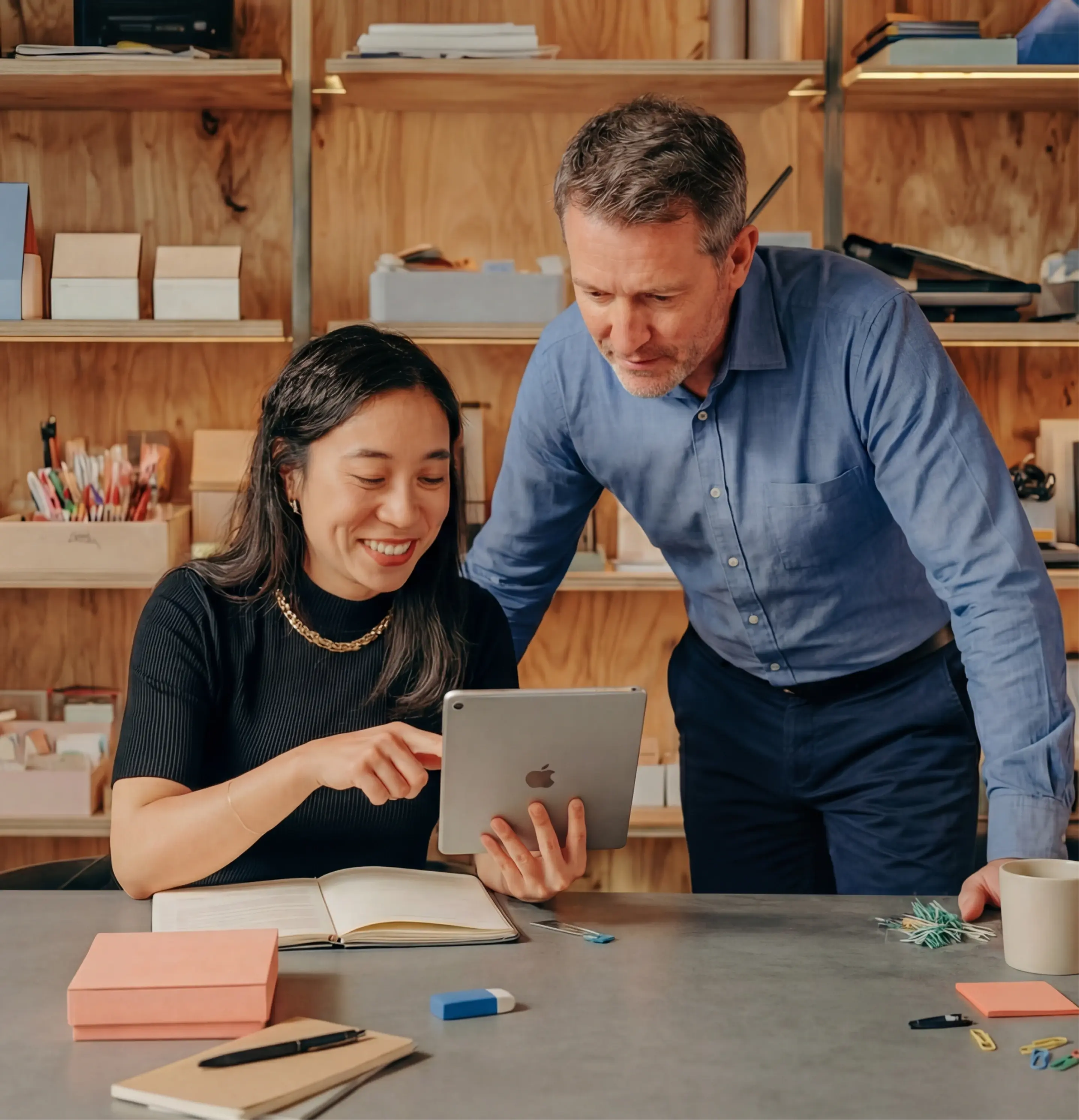 Team reviewing demo on tablet